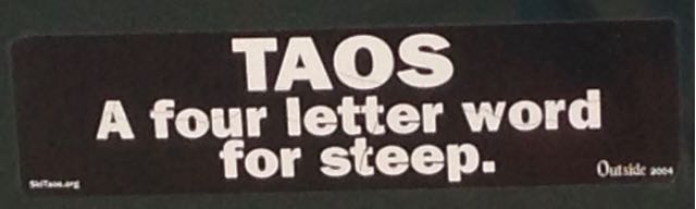 Bumper sticker that reads "Taos. A four letter word for steep."